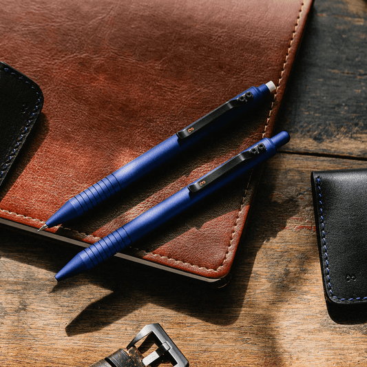 EDC Sale pen and pencil combo on a desk. 