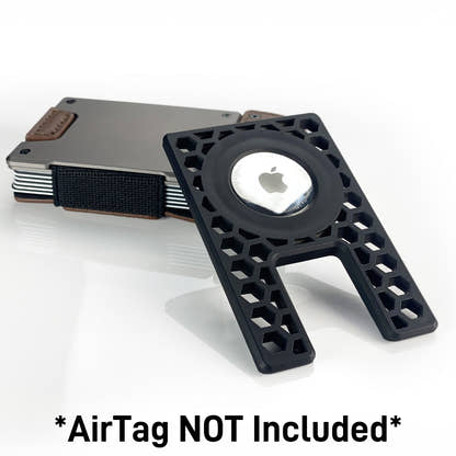 PROOF AirTag holder angled beside a satin gunmetal PROOF wallet with an Apple AirTag seated in the frame, captioned 'AirTag NOT Included'