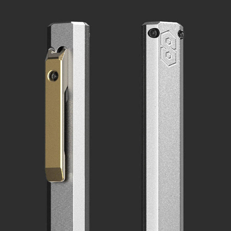 Two close-up views of the PROOF Vanguard pen on a dark background: the brass clip and bolt on one side, the embossed hexagon logo on the other